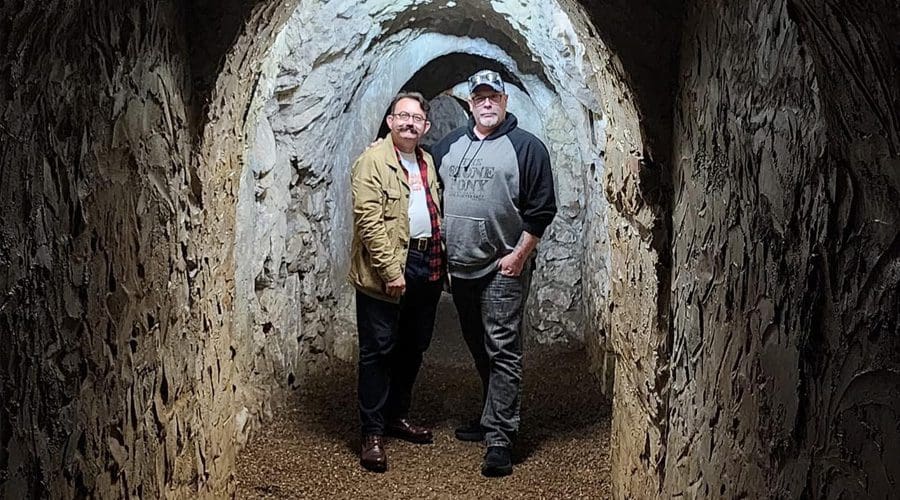 Dave Schrader and Neil Storey in the Hellfire Caves of England