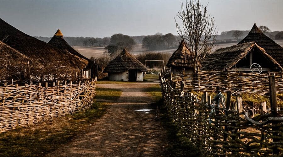 Butser Ancient Farm on a misty morning, Chalton, England.