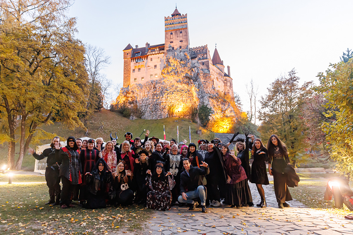 Our travelers celebrating Halloween in Bran Castle. legends, spiritual journey