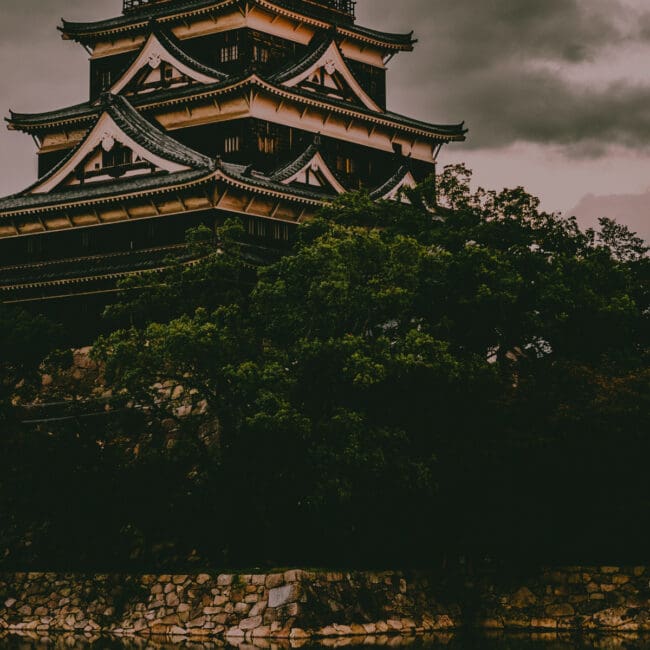 Cloudy, moody view of Hiroshima Castle in Japan.