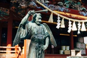 Statue of the Japanese Tengu, a magical creature whose tale is a great example of the importance of sustainable tourism for a spiritual journey.